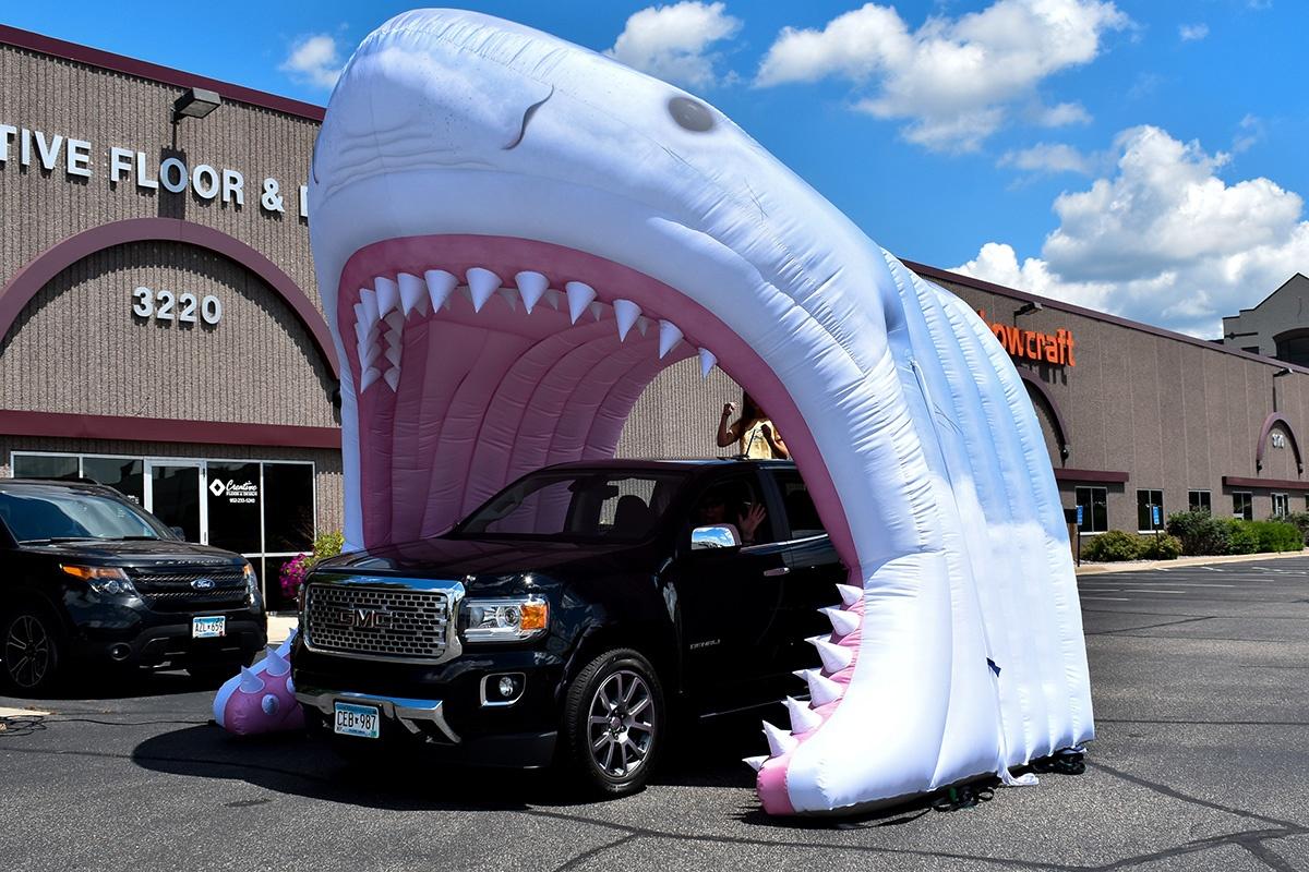 custom inflatable shark tunnel outside in parking lot