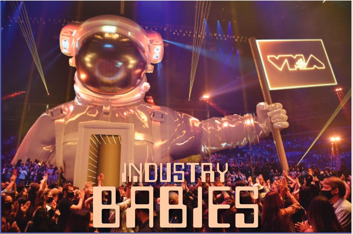giant inflatable moon person on stage at the VMAs award show