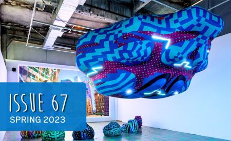 issue 67 cover featuring custom inflatable brain display