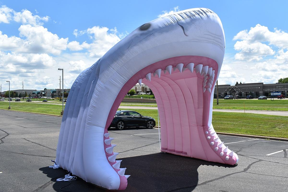 custom inflatable shark tunnel outside in parking lot