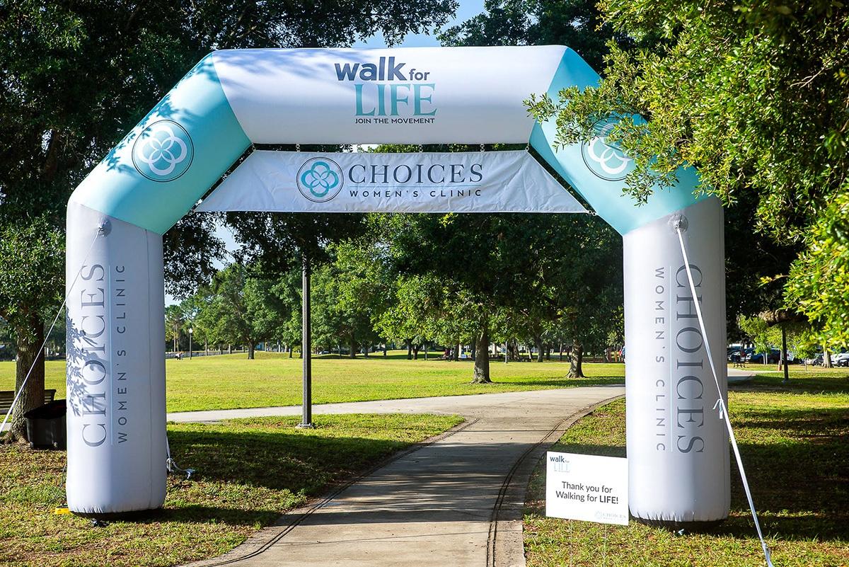 custom inflatable walk for life arch outdoors across walking path