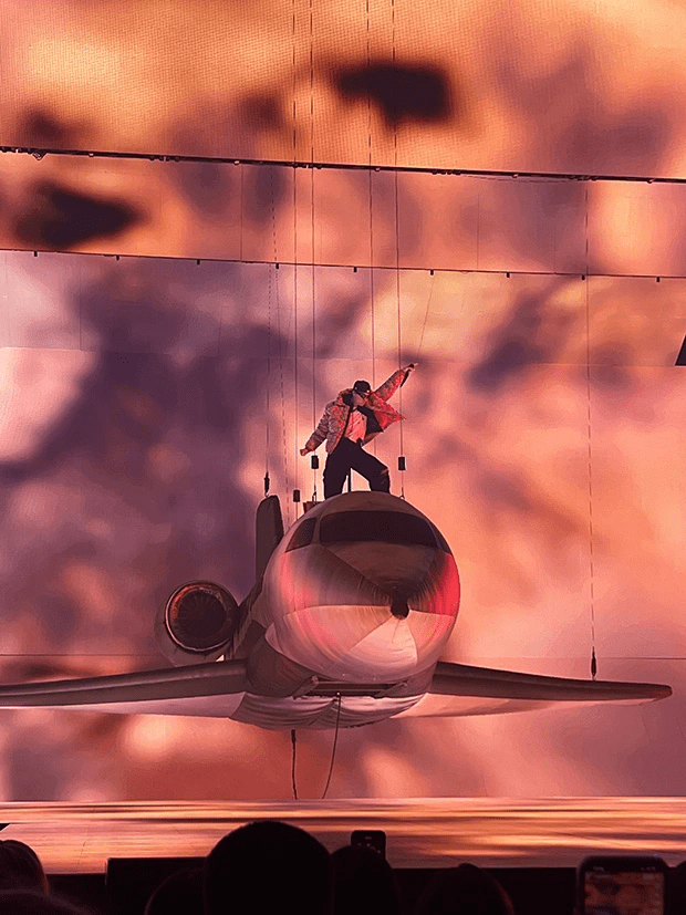 Justin Bieber on top of custom inflatable airplane during Justice tour