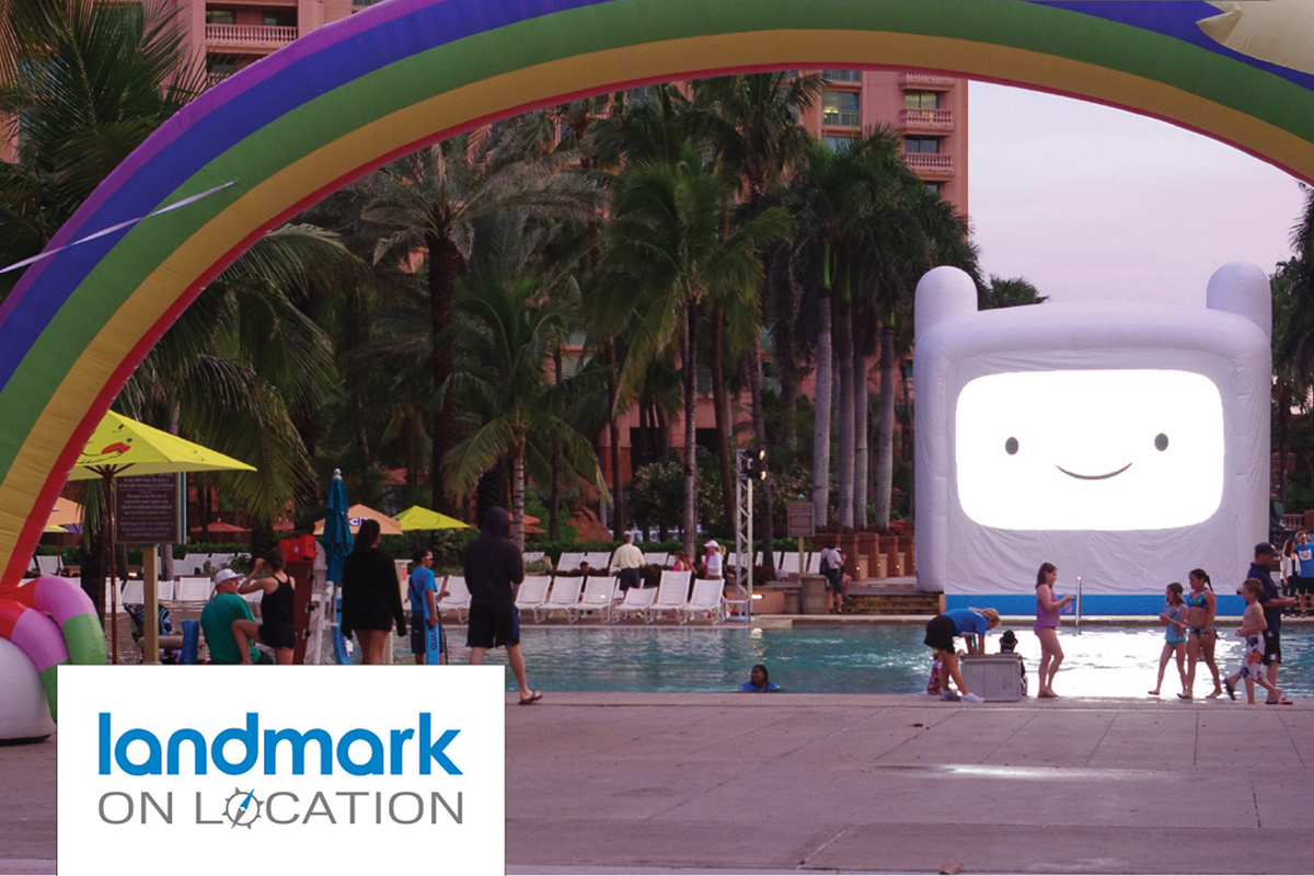 Adventure Time custom inflatable LED screen and rainbow at Atlantis resort pool