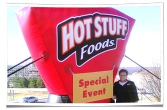 Inflatable Hot Stuff Foods Logo at Marketing Event