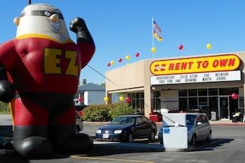 Inflatable Captain EZ Mascot at E-Z Rent to Own Retail Location