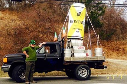 custom inflatable Montauk Inflatable Beer Can on back of pick-up truck