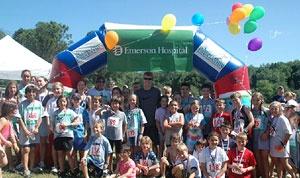 Race Participants with Lincoln Kids Triathlon Inflatable Arch