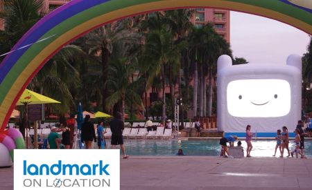 Adventure Time custom inflatable LED screen and rainbow at Atlantis resort pool