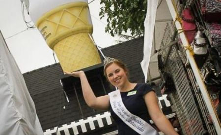 custom inflatable ice cream cone with model at fairgrounds