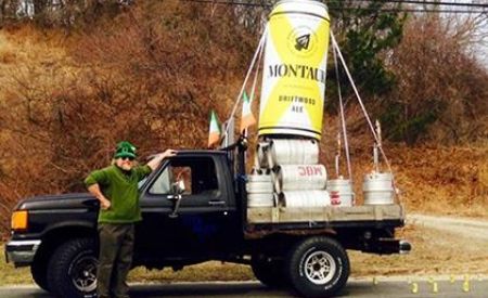 custom inflatable Montauk beer can on back of pick-up truck