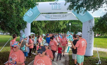 custom inflatable walk for life arch outdoors across walking path